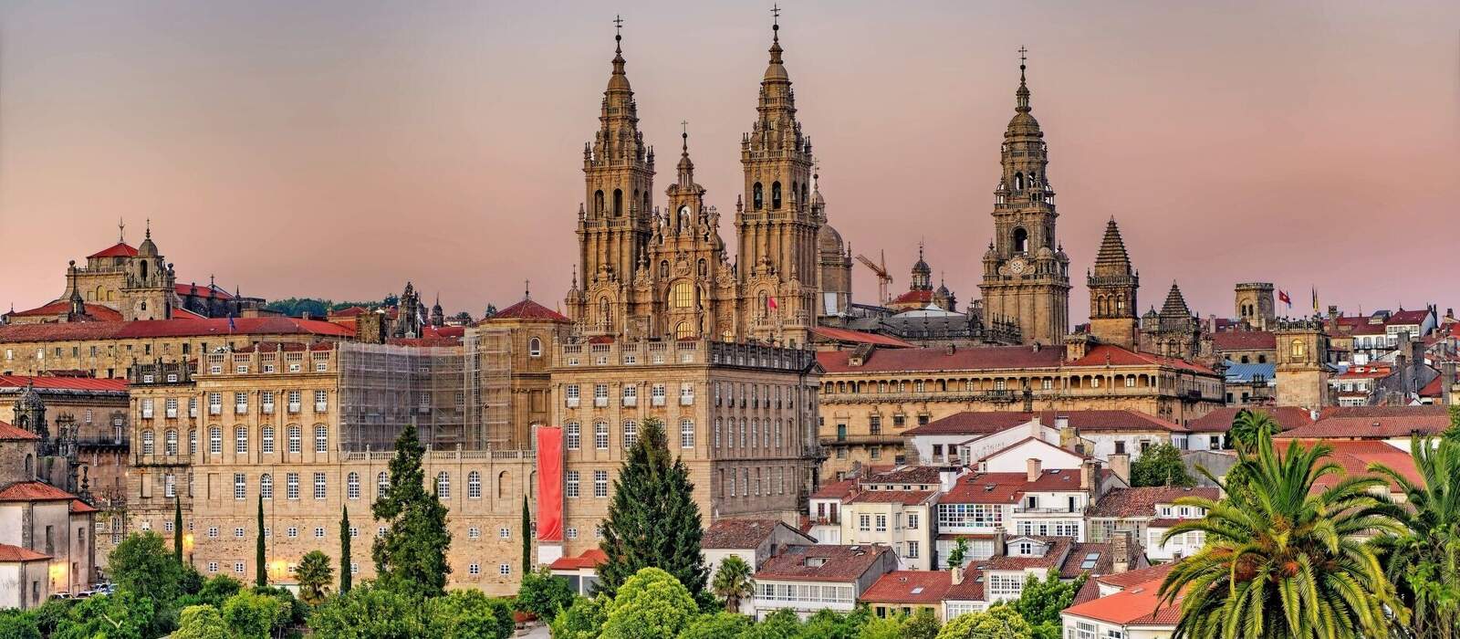 Hazy sunset on monumental Santiago de Compostela cathedral. © Lux Blue - stock.adobe.com